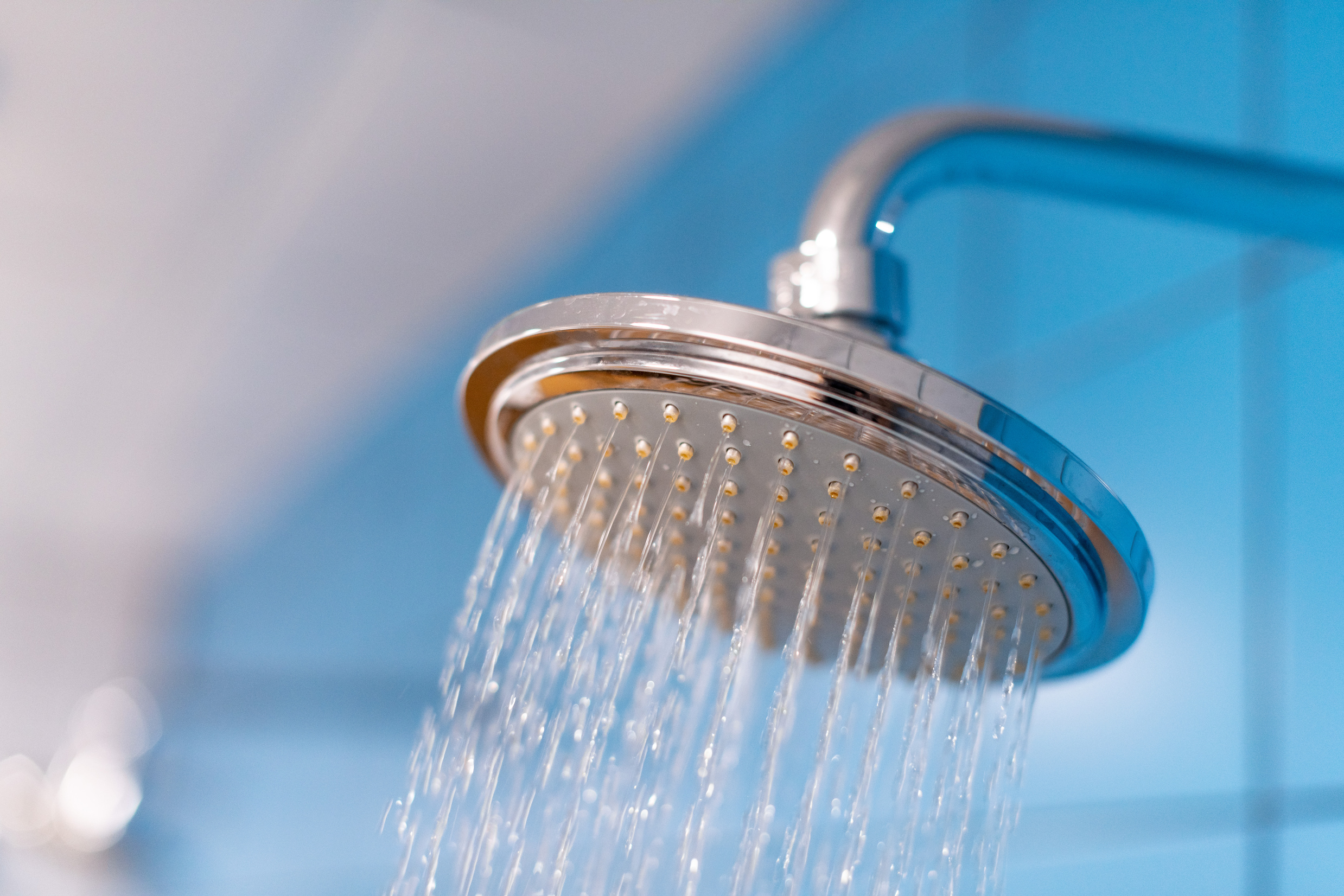 Shower head with refreshing cold water. Water supply is turned on